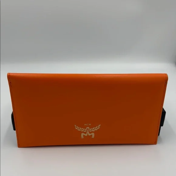 MCM Vibrant Orange Leather Clutch